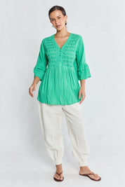 Model Genericm wearing size sample of the Marilyn Shirt – Sea in colour Sea, from the front