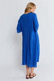 Model Genericm wearing size sample of the Marilyn Midi Dress – Azure in colour Azure, from the front