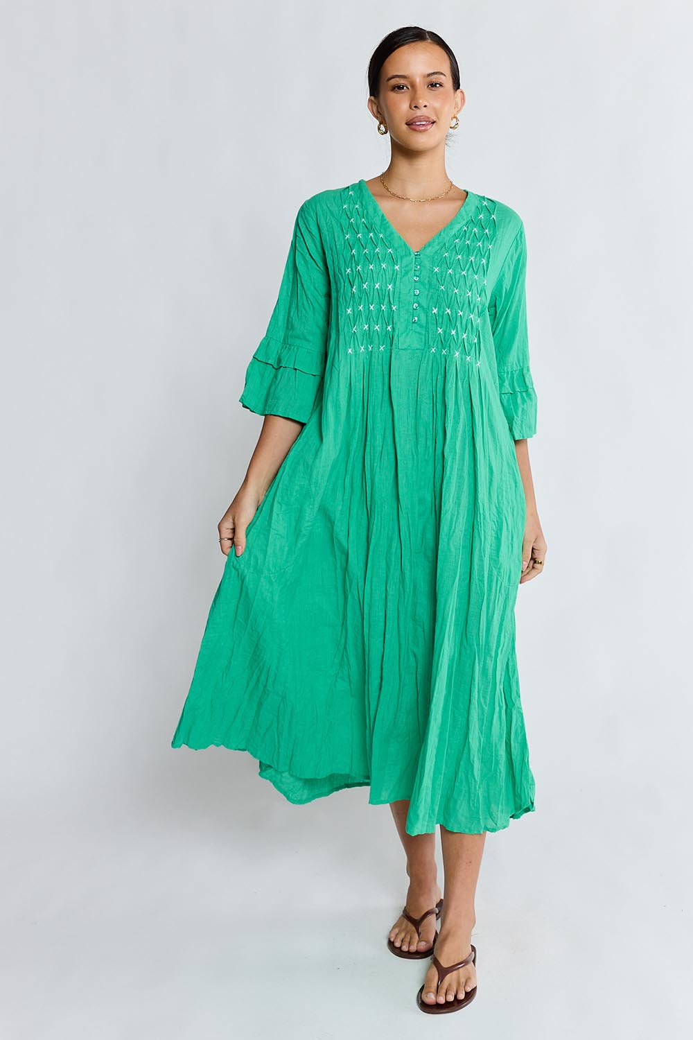 Model Genericm wearing size sample of the Marilyn Midi Dress – Sea in colour Sea, from the front