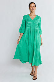 Model Genericm wearing size sample of the Marilyn Midi Dress – Sea in colour Sea, from the front