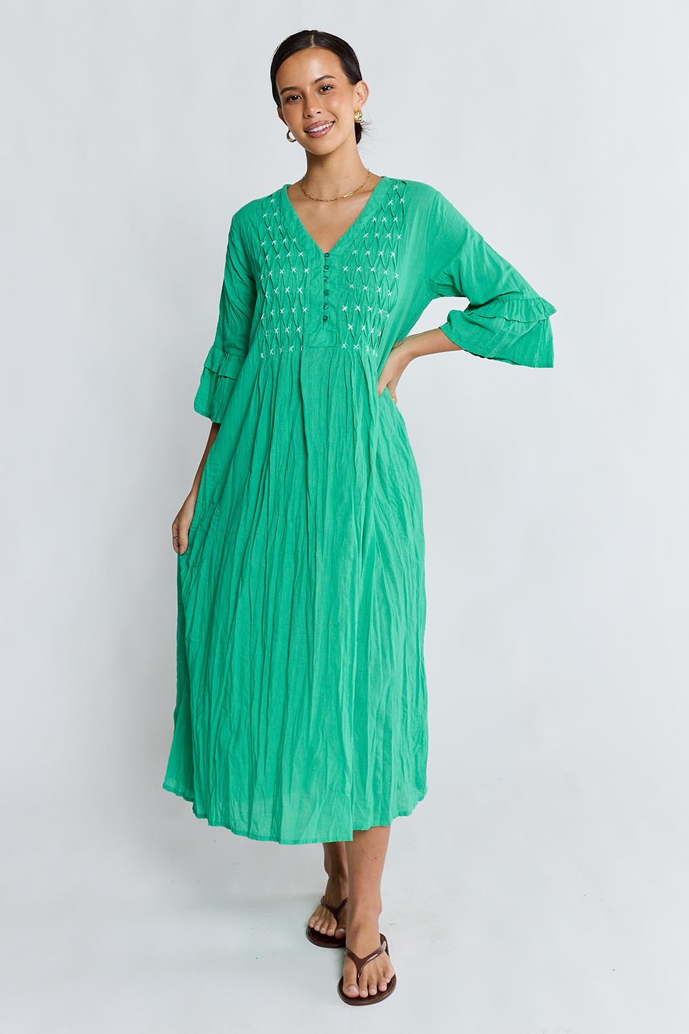 Model Genericm wearing size sample of the Marilyn Midi Dress – Sea in colour Sea, from the front