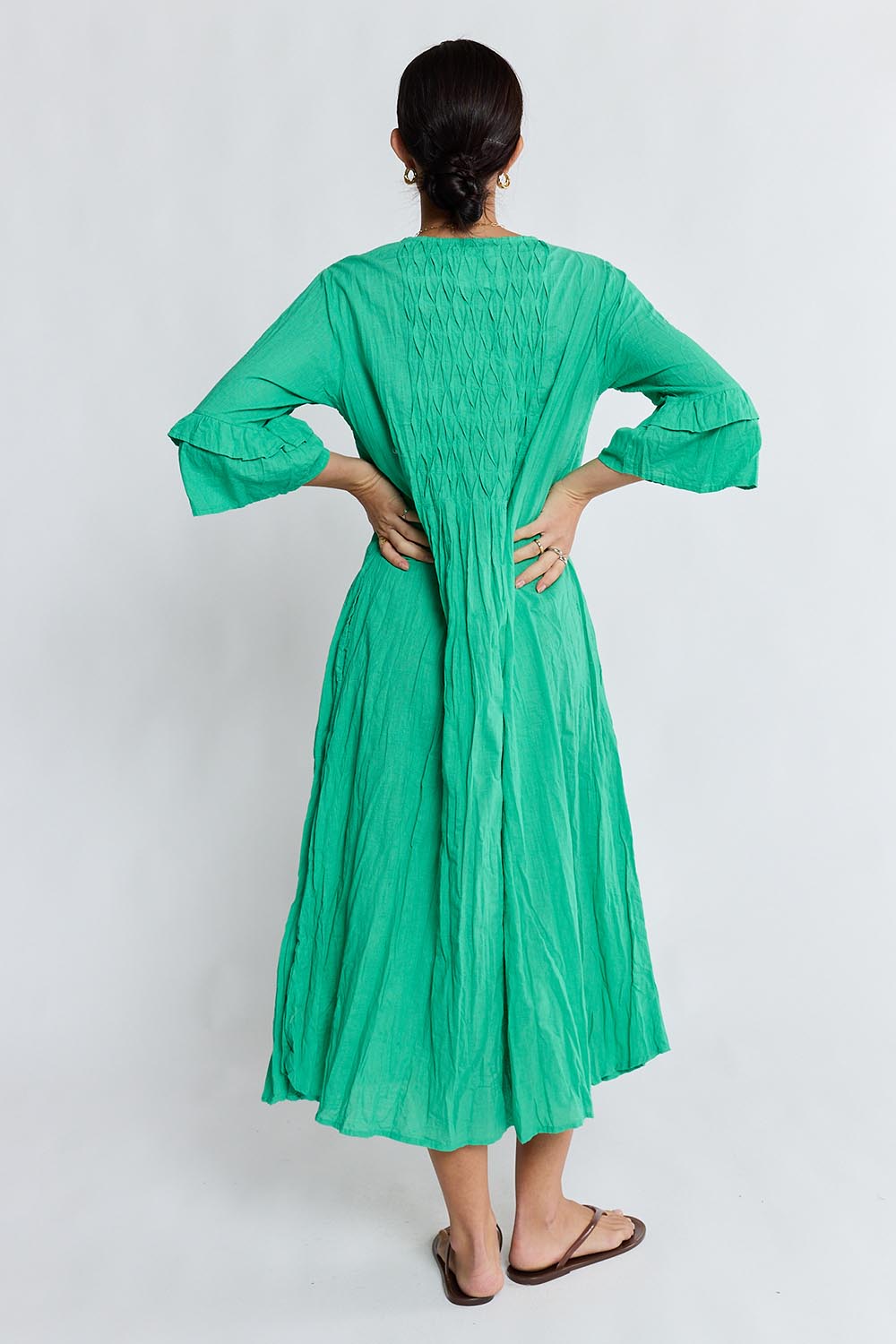 Model Genericm wearing size sample of the Marilyn Midi Dress – Sea in colour Sea, from the front