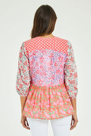 Model Madeline wearing size S of the Maud Top in colour Multi (Pink), from the back