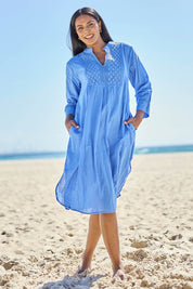 Model Eshan wearing size 10 of the Millie Midi Dress - Sky in colour Sky, from the front