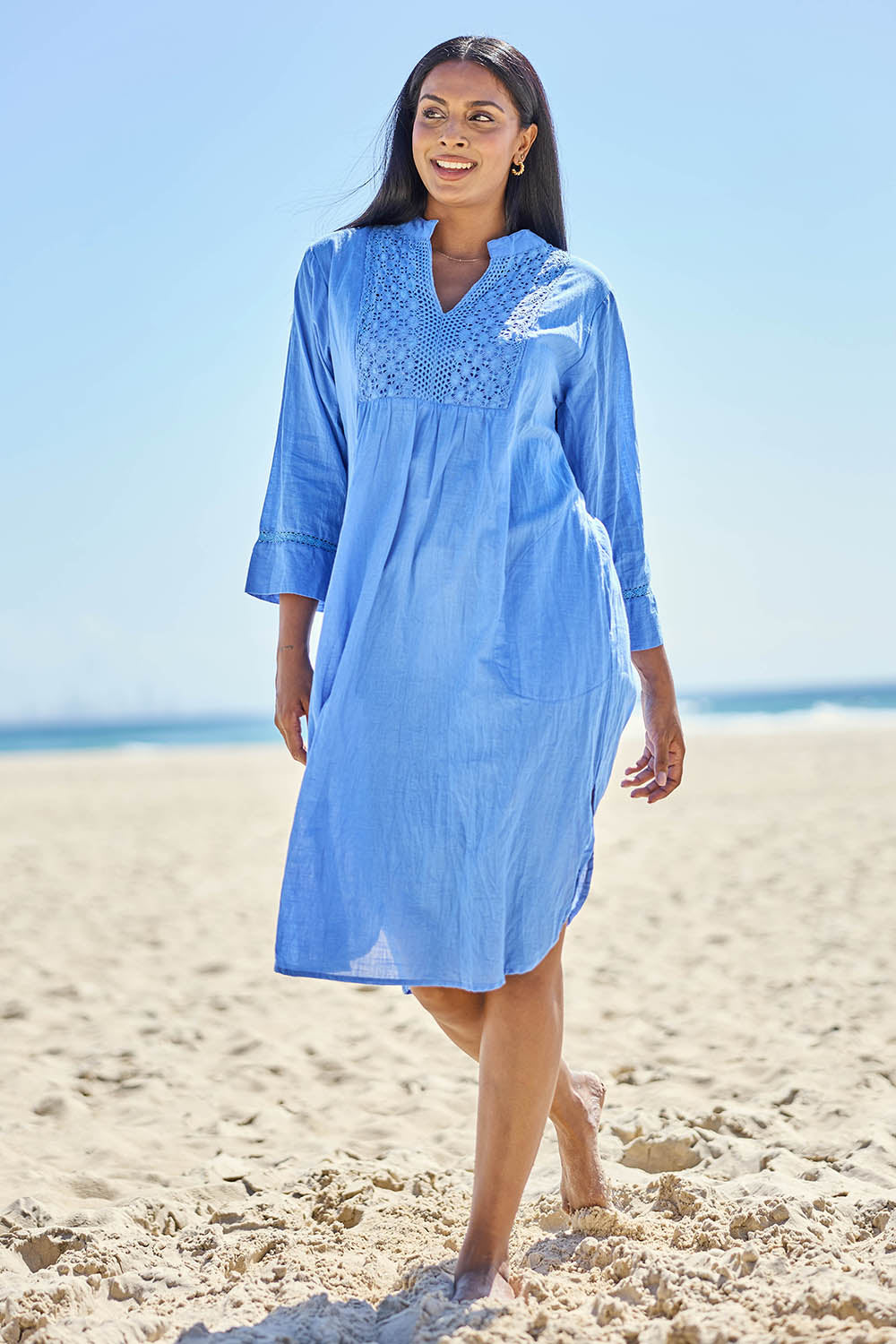 Model Eshan wearing size 10 of the Millie Midi Dress - Sky in colour Sky, from the front