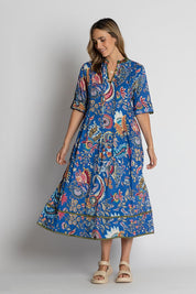 A model wearing the Nandita Cotton Midi Dress in colour Ocean (Blue), from the front, showing the whole outfit