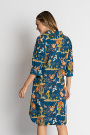 A model wearing the Prairie Cotton Shirtdress in colour Navy (Blue), from the back
