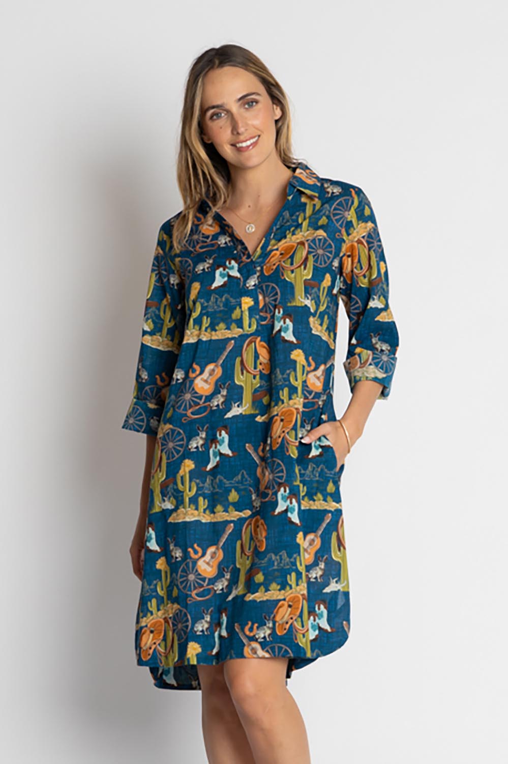 A model wearing the Prairie Cotton Shirtdress in colour Navy (Blue), from the front, cropped image