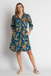 A model wearing the Prairie Cotton Shirtdress in colour Navy (Blue), from the front, showing the whole outfit