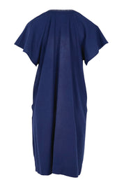 Product shot of the Remi Dress – Navy in colour Navy, from the back