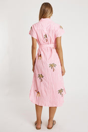 A model wearing the Sahara Cotton Shirtmaker Dress in colour Candy (Pink), from the back