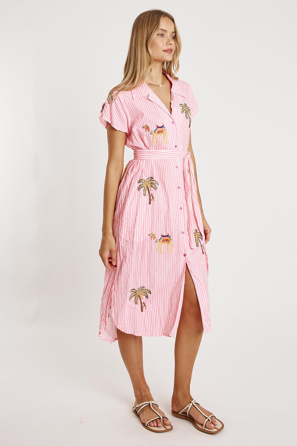 A model wearing the Sahara Cotton Shirtmaker Dress in colour Candy (Pink), from the front, showing the whole outfit