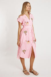 A model wearing the Sahara Cotton Shirtmaker Dress in colour Candy (Pink), from the front, showing the whole outfit