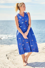 Model Bianca wearing size S of the Sardine Tie Cotton Midi Dress in colour Ocean (Blue), from the front, showing the whole outfit