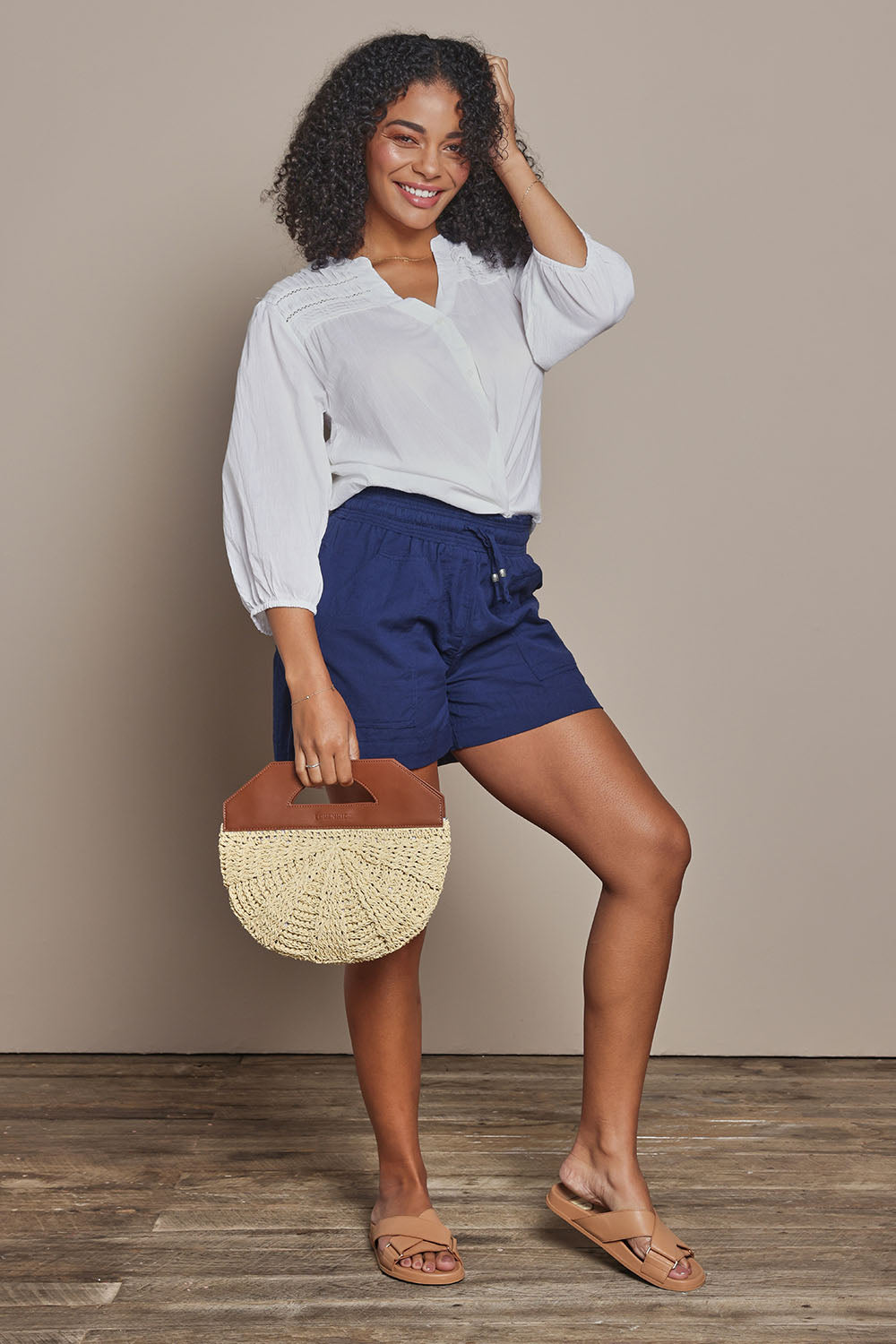 Model Ziara wearing size S of the Shayna Cotton Shirt in colour White (White), from the front, showing the whole outfit