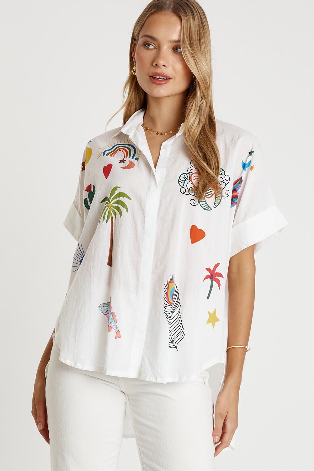 A model wearing the Tillie Cotton Shirt in colour White (White), from the front, cropped image