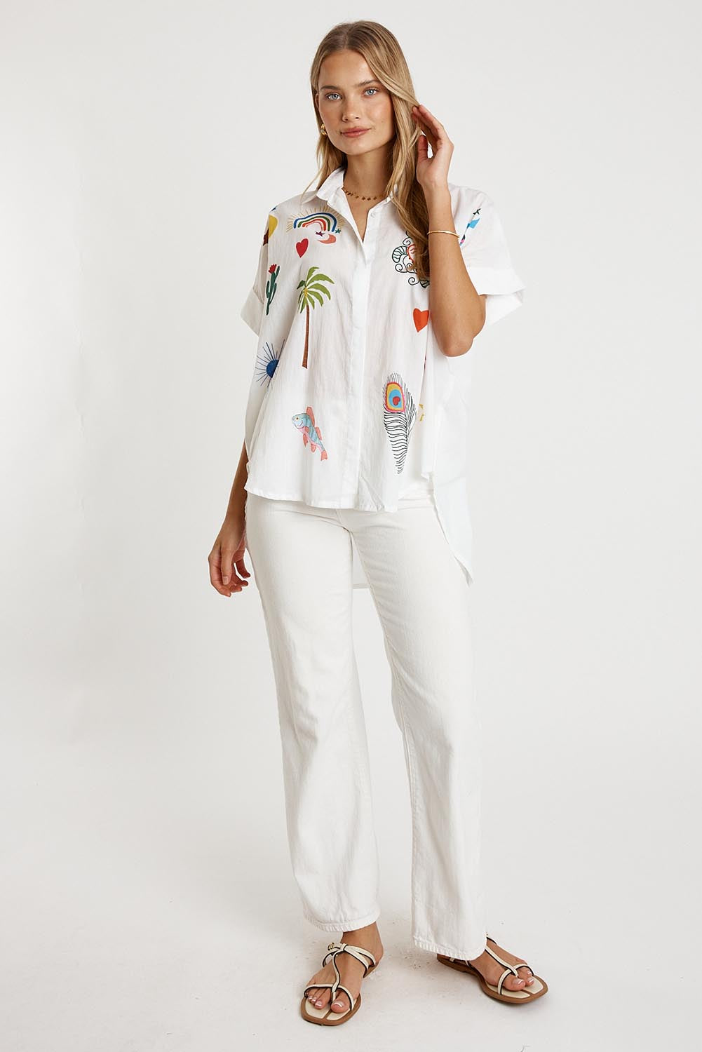 A model wearing the Tillie Cotton Shirt in colour White (White), from the front, showing the whole outfit