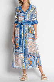 A model wearing the Velora Midi Dress in colour Ocean (Blue), from the front, cropped image