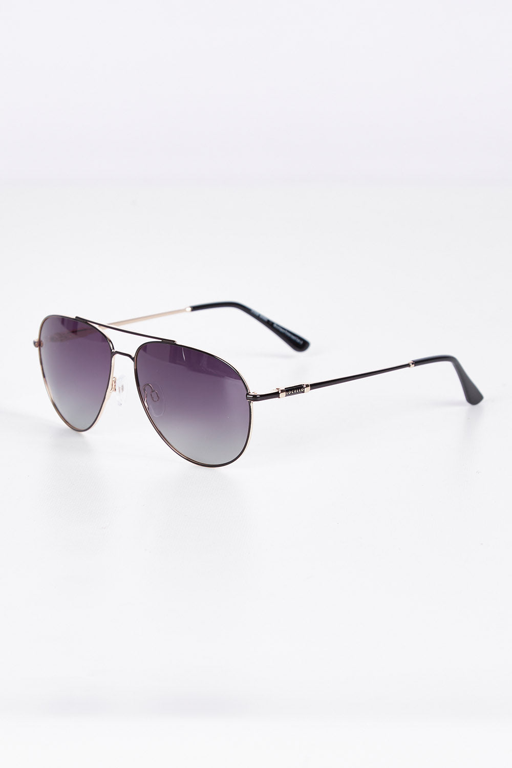 A model wearing size OneSize of the Mara Sunglasses in colour Black (Black), from the front, showing the whole outfit