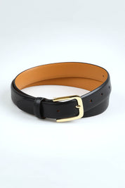 A model wearing size S of the Bliss Leather Belt in colour Black (Black), from the front, showing the whole outfit
