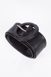 A model wearing size S of the Skye Wide Leather Waist Belt in colour Black (Black), from the front, showing the whole outfit
