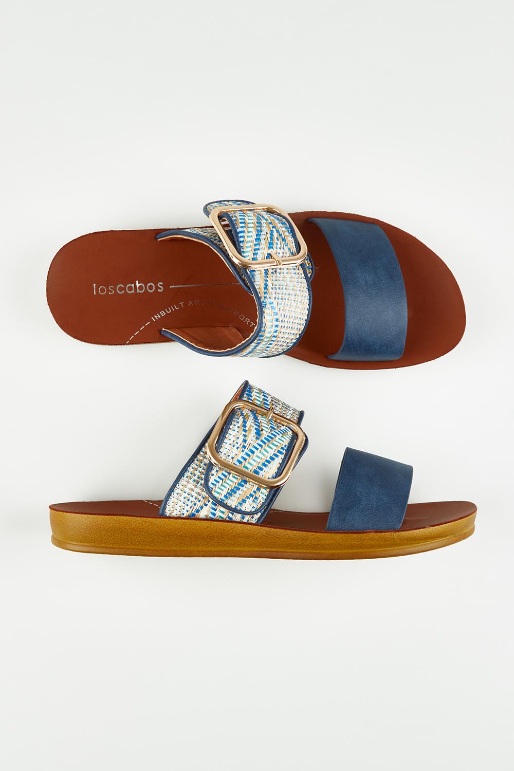 A model wearing size 37 of the Doti Double Strap Slide in colour Navymulti (Blue), from the front, showing the whole outfit