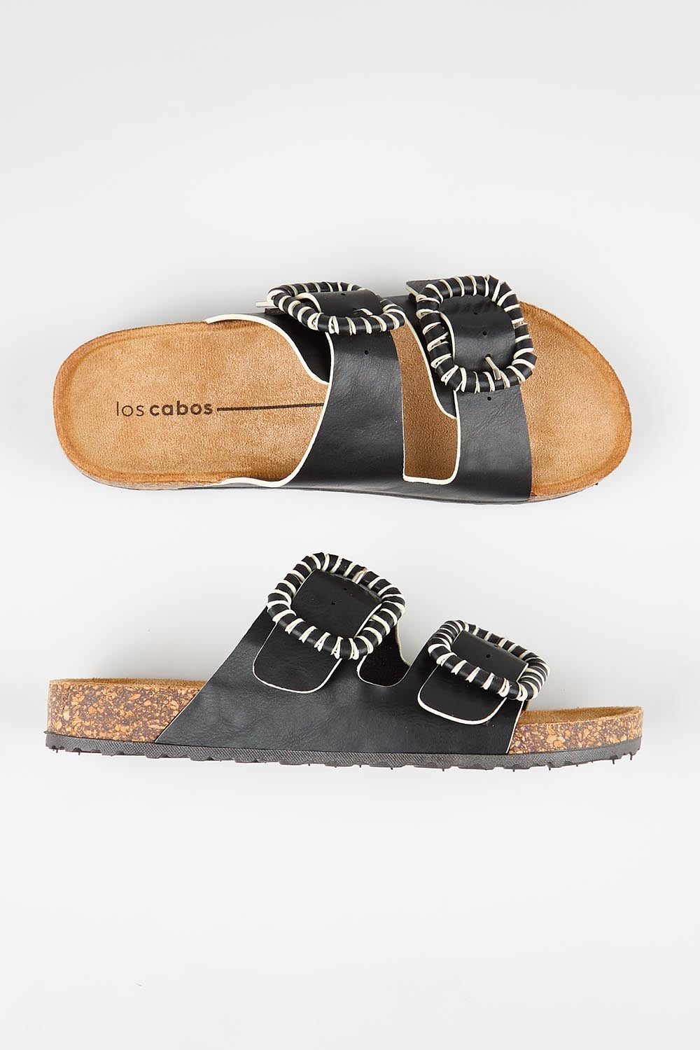 Model Genericm wearing size sample of the Jirona Slide - Black in colour Black, in a cropped view