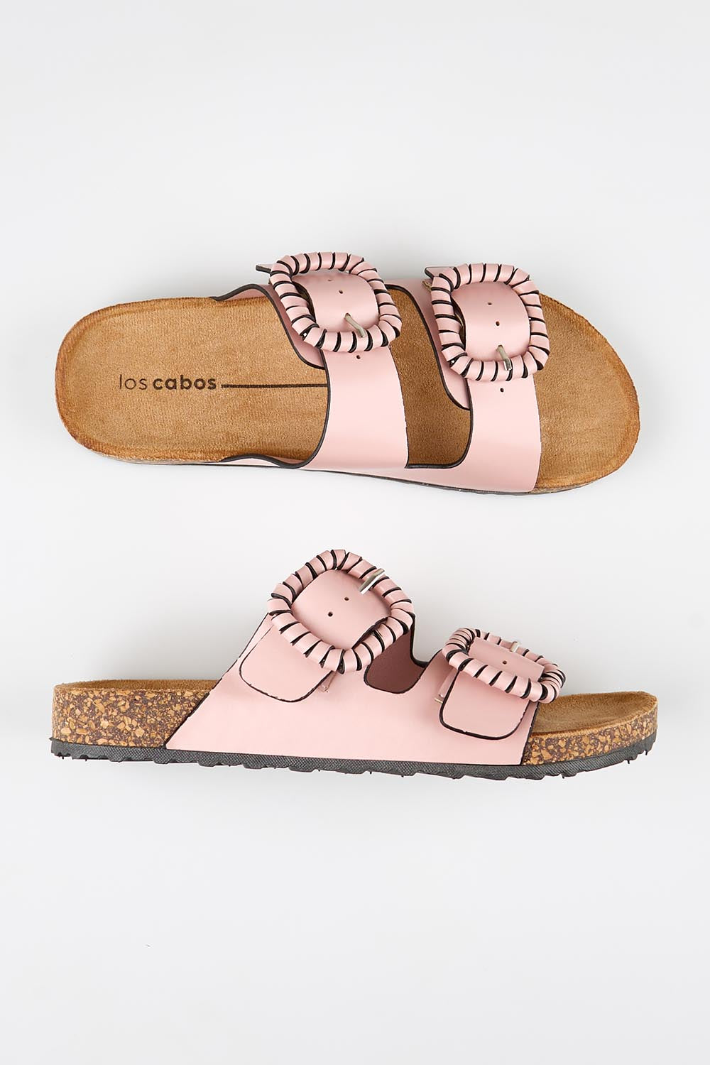 Model Genericm wearing size sample of the Jirona Slide - Pink in colour Pink, in a cropped view