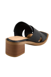 Product shot of the Meri Heel - Black in colour Black, from the back