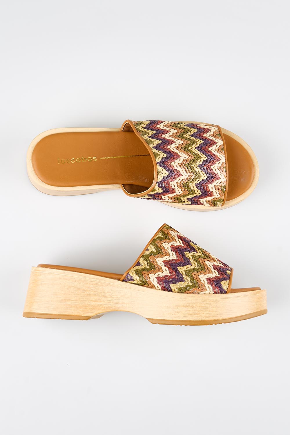 Model Genericm wearing size sample of the Seli Slide - Brownmulti in colour Brownmulti, in a cropped view