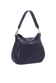 Product shot of the Nadia Shoulder Bag - Navy in colour Navy, from the back