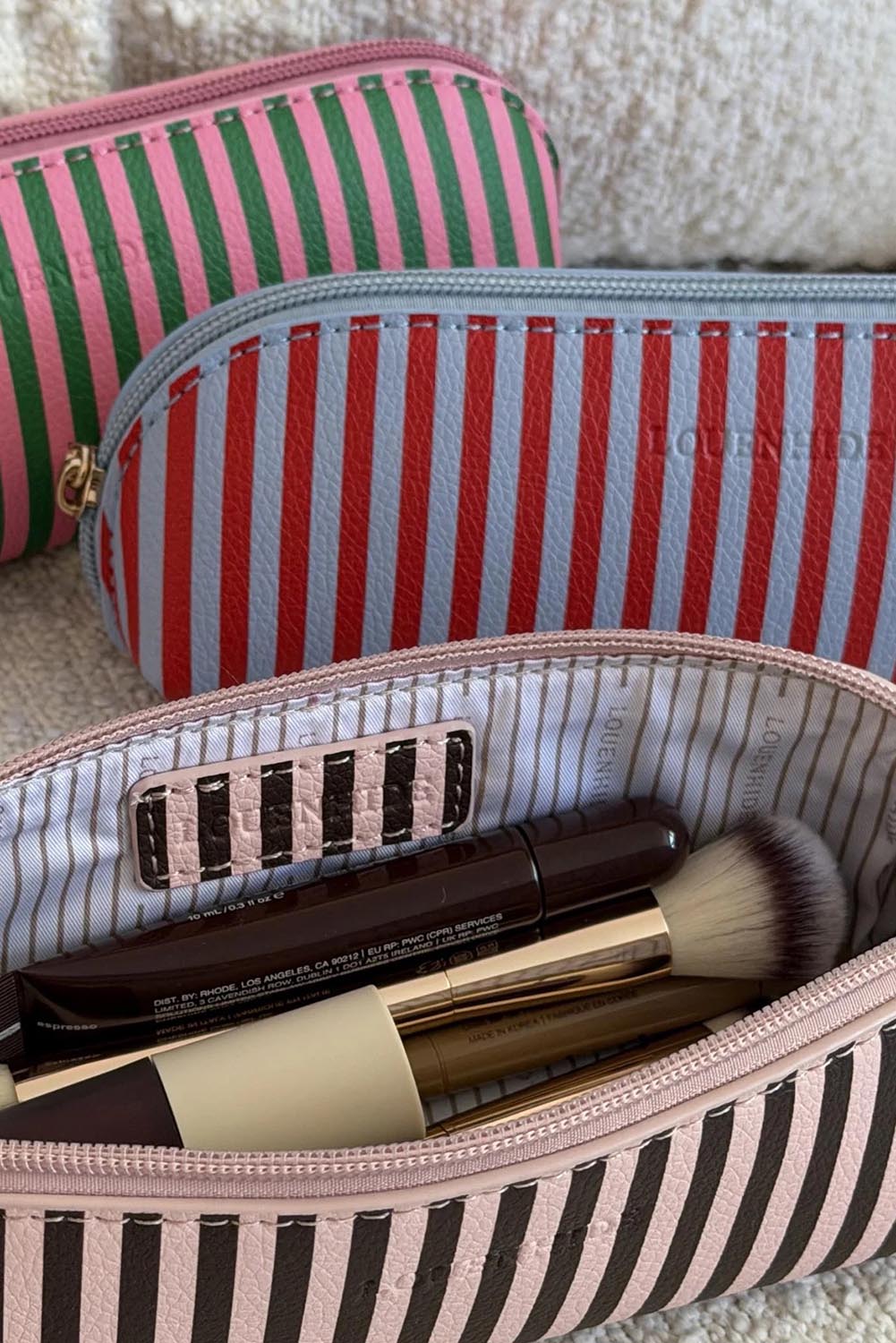 Product shot of the Jayne Stripe Makeup Bag - Redskystripe in colour Redskystripe, from the front