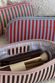 Product shot of the Jayne Stripe Makeup Bag - Redskystripe in colour Redskystripe, from the front
