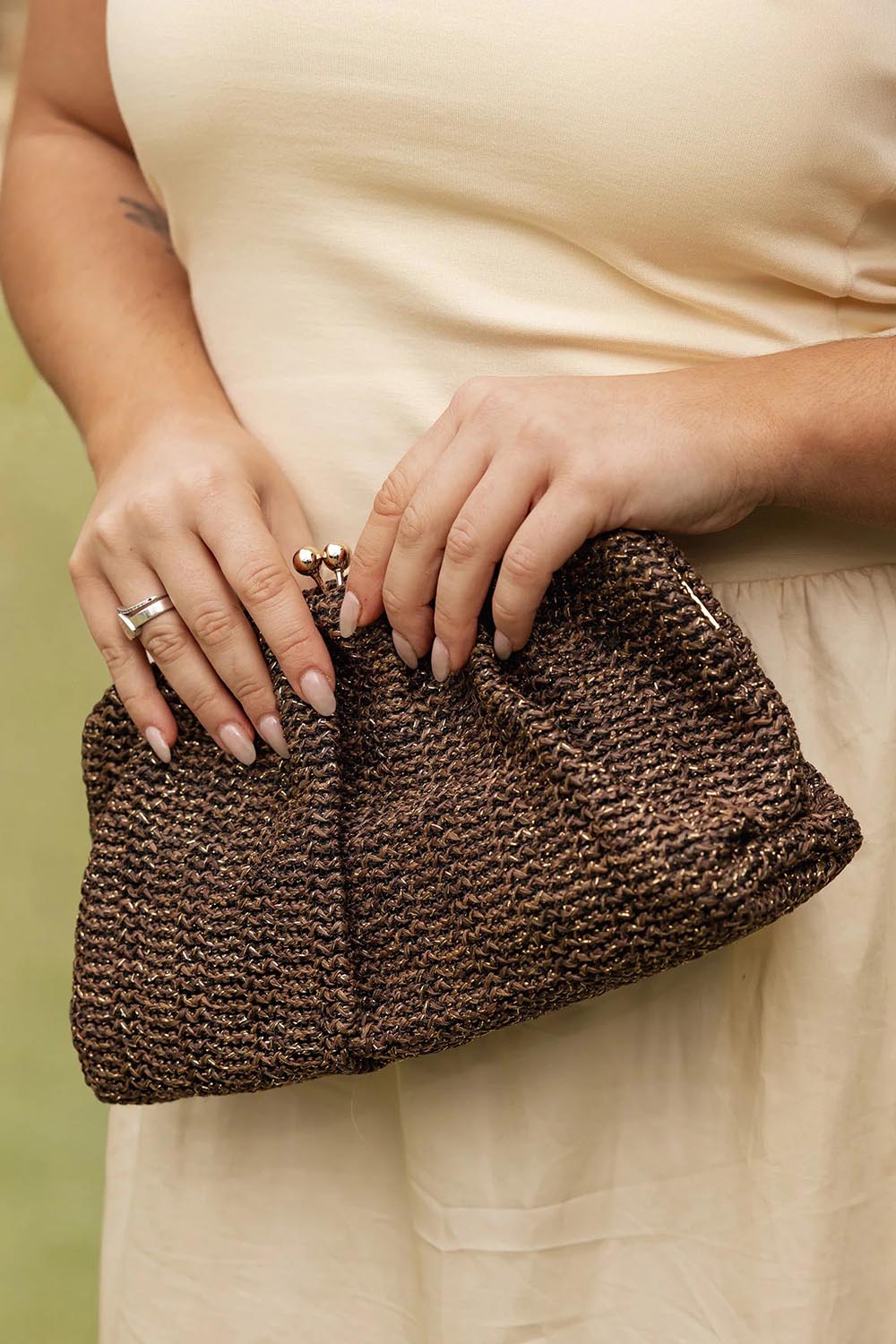 Product shot of the Goldie Clutch - Raffiachocolate in colour Raffiachocolate, from the front