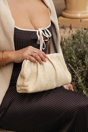 Product shot of the Goldie Clutch - Raffiavanilla in colour Raffiavanilla, from the front