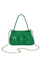 Product shot of the Uma Day Night Crossbody Bag in colour Emerald (Green), from the front