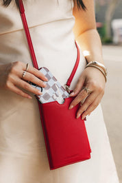 Product shot of the Suki Phone Bag - Red in colour Red, from the front