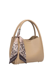 Product shot of the Steffie Mini Tote Bag - Biscuit in colour Biscuit, showing detail