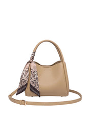 Product shot of the Steffie Mini Tote Bag - Biscuit in colour Biscuit, from the front