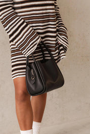 Product shot of the Steffie Mini Tote Bag - Black in colour Black, from the back