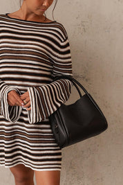 Product shot of the Steffie Mini Tote Bag - Black in colour Black, from the front