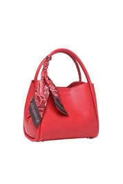 Product shot of the Steffie Mini Tote Bag - Red in colour Red, from the back