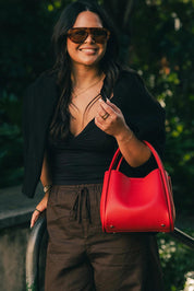 Product shot of the Steffie Mini Tote Bag - Red in colour Red, from the front