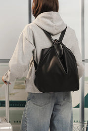 Model Genericm wearing size sample of the Miley Convertible Backpack - Black in colour Black, from the back