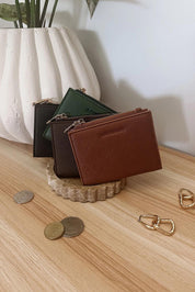 Product shot of the Lily Wallet - Black in colour Black, from the back