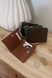 Product shot of the Lily Wallet - Black in colour Black, from the front