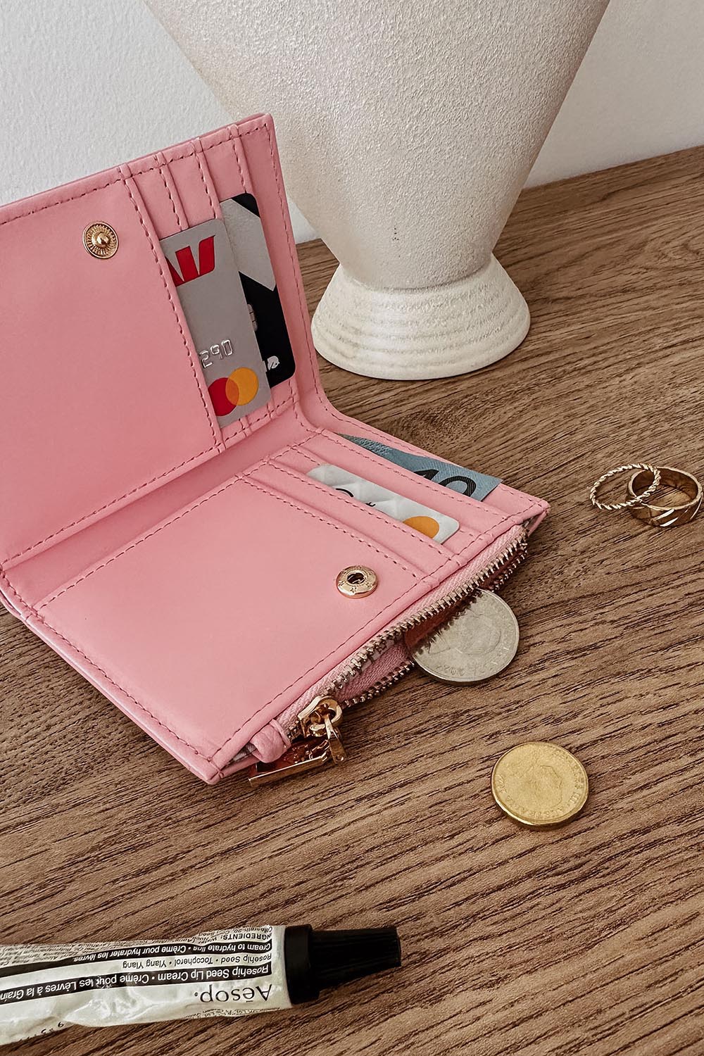 Product shot of the Lily Wallet - Pink in colour Pink, showing detail