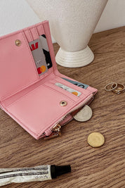Product shot of the Lily Wallet - Pink in colour Pink, showing detail
