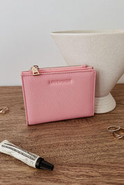 Product shot of the Lily Wallet - Pink in colour Pink, from the front