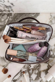 Product shot of the Ellis Makeup Bag - Chocolate in colour Chocolate, from the back